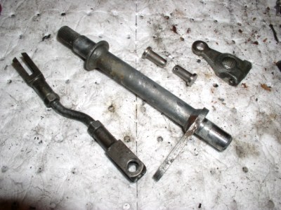 Cleaned the shift linkage, drilled for oversized clevis pins - no more slop in the linkage. 