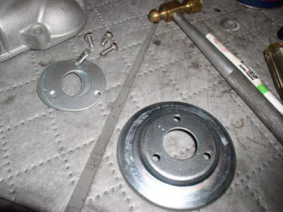 Shiny shims and pulley half.