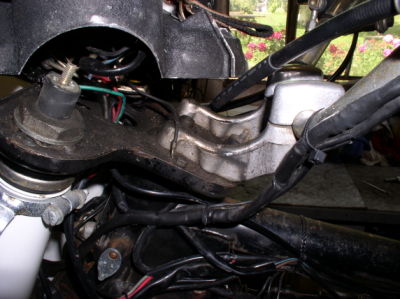 Steering head bearings are too tight and rough, starting disassembly.